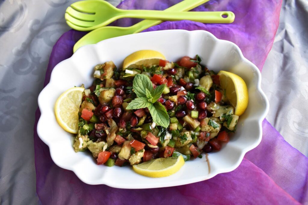 Lebanese Grilled Eggplant served in a white oval dish