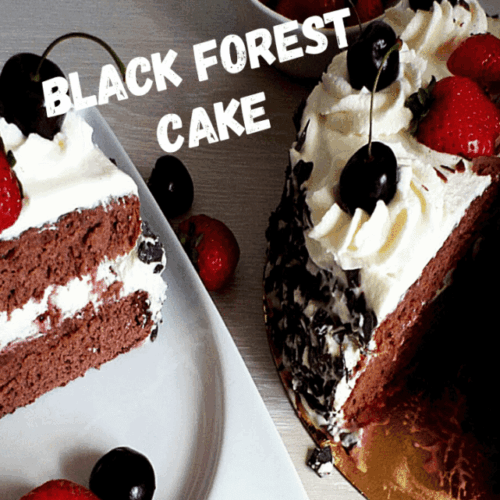 Homemade Black Forest cake with rich chocolate layers, topped with whipped cream and cherries, served on a plate with one slice cut and placed beside it.