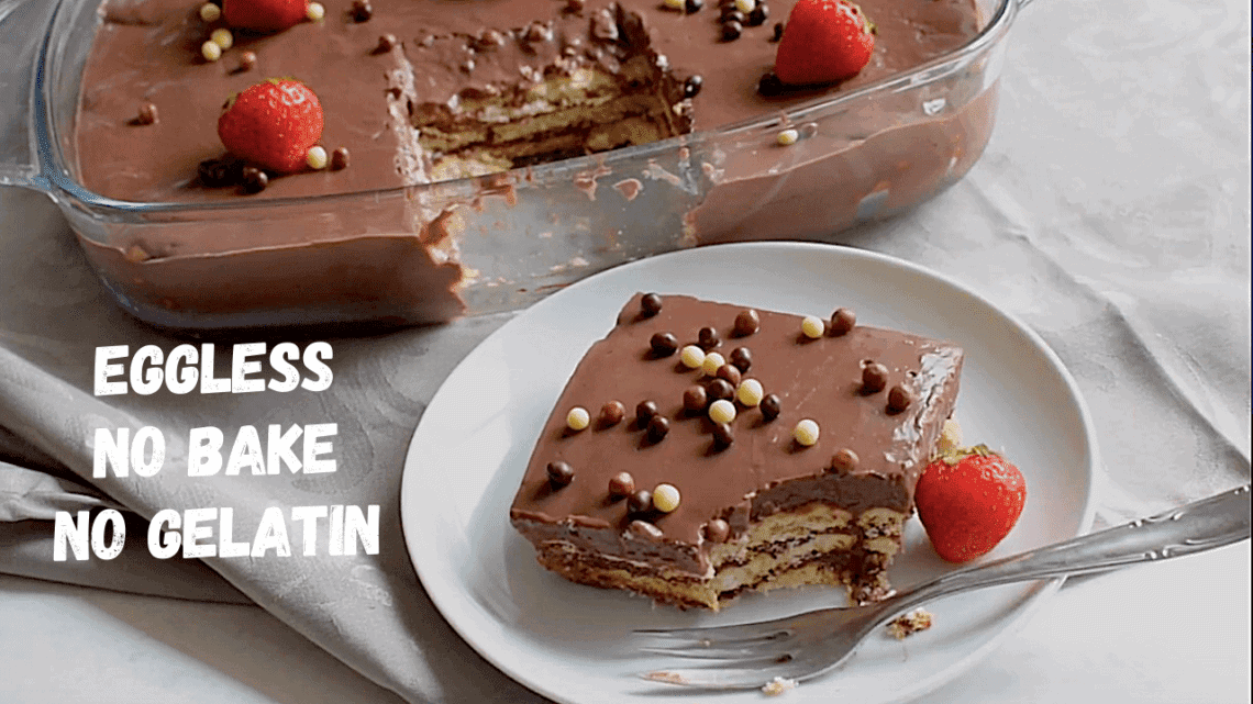 A slice of chocolate pudding alternating with biscuit layers, topped with pearl candy and strawberries and a pyrex dish with the other slices behind